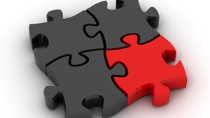 Fire puslespilsbrikker tre grå en rød