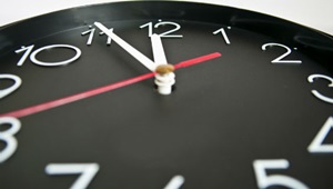 Ur, der viser fem minutter i 12.